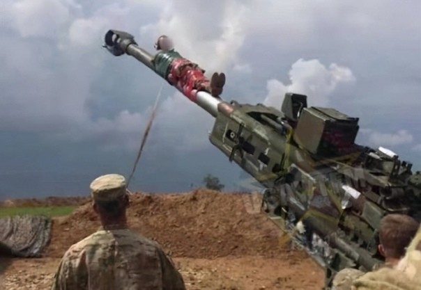 US Army Terrorist firing a cannon with an Afghan citizen tied tied to it