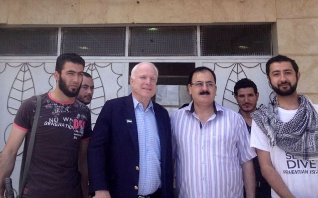 McCain with ISIS's leader Al Bagdadi and other fellow terrorists created by the US