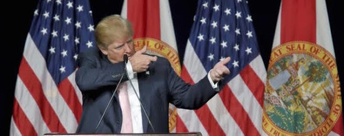 trump com o dedo no gatilho.jpg