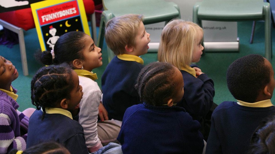 2021-05-19 school-children-being-read-to-16x9.jpg