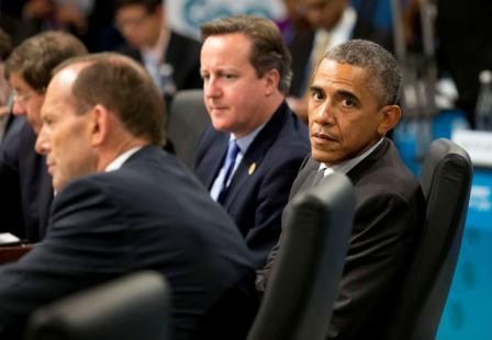 us_president_barack_obama_r_sits_alongside_prime_m