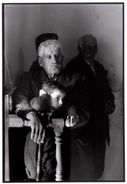 Man and child in Church, Karphatos, Greece, 1962.j
