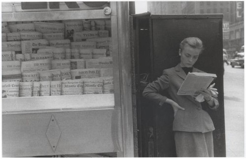 Elbowing an Out of Town Newsstand - 1954.jpg