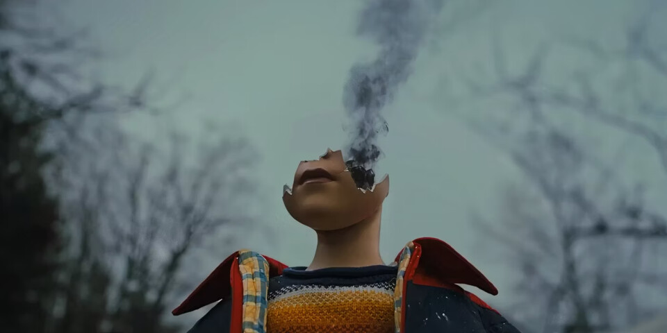 a-doll-with-its-head-cracked-and-smoking-in-longle