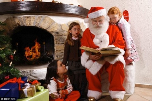1401873887394_wps_2_Santa_Claus_reading_to_ch.jpg
