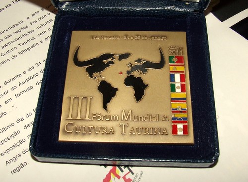 A medalha comemorativa do evento do fim-de-semana...