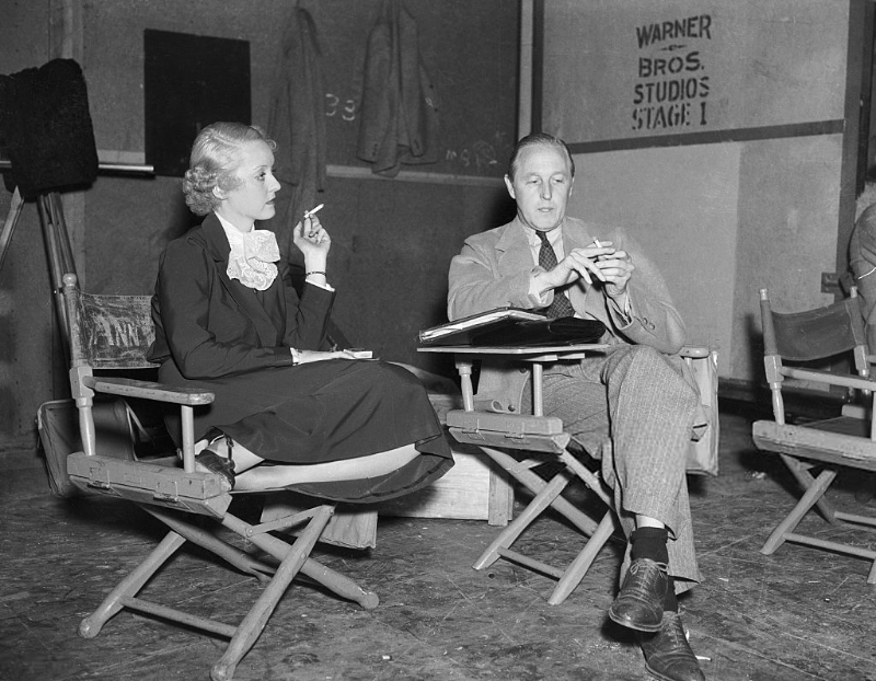 Bette Davis and William Keighley on the set at War
