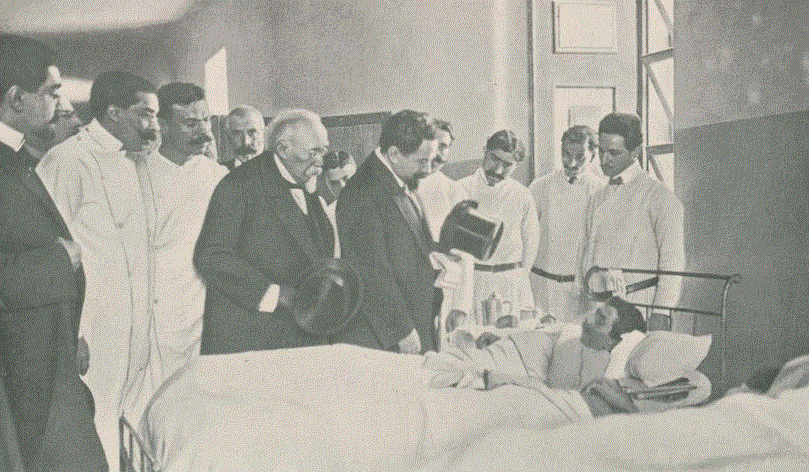 visita a um ferido da explosao.GIF