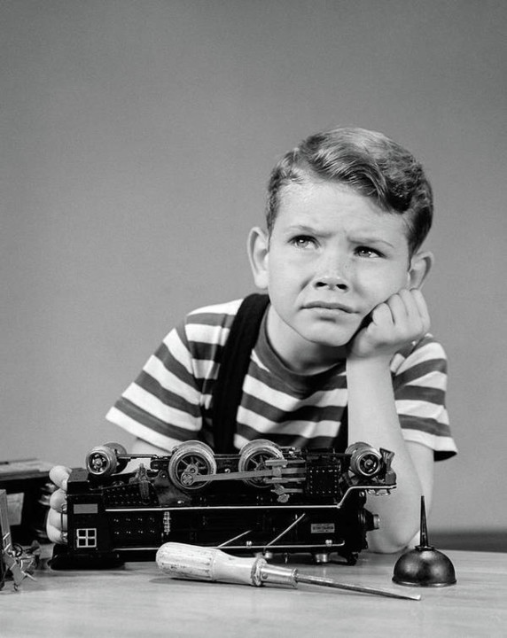 1930s-1940s-little-boy-thinking-or-vintage-images.