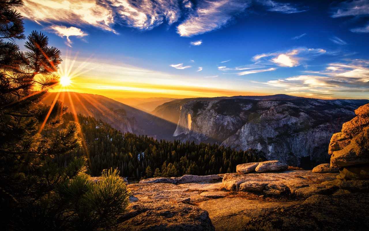 Sunrise-landscape-mountains-forest-pine-trees-sun-