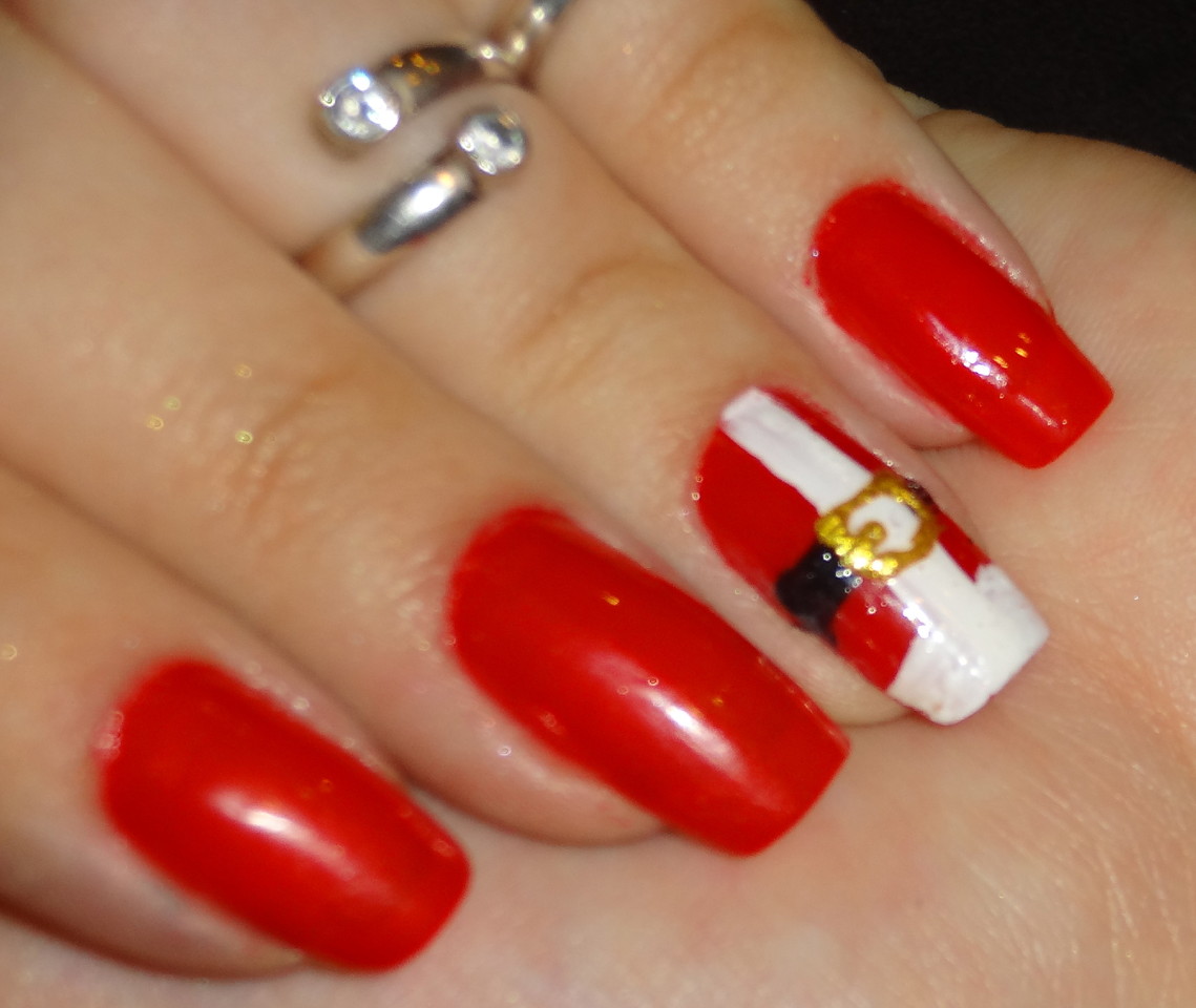 unhas com fato de pai natal.jpg