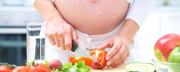 pregnant-woman-preparing-food.jpg pregnant-woman-preparing-food.jpg