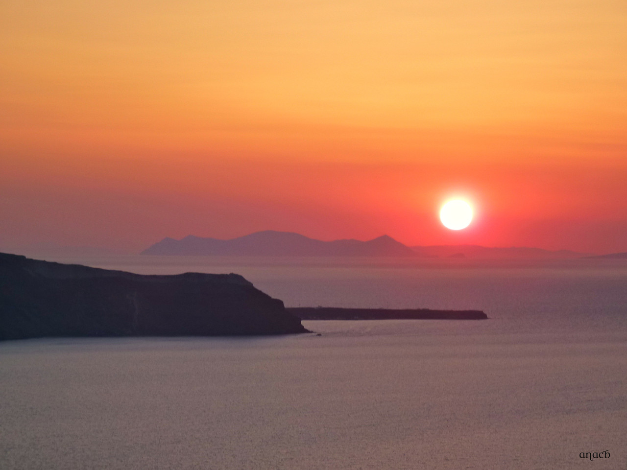 Santorini-o pôr-do-sol visto de Fira (1544) cópi