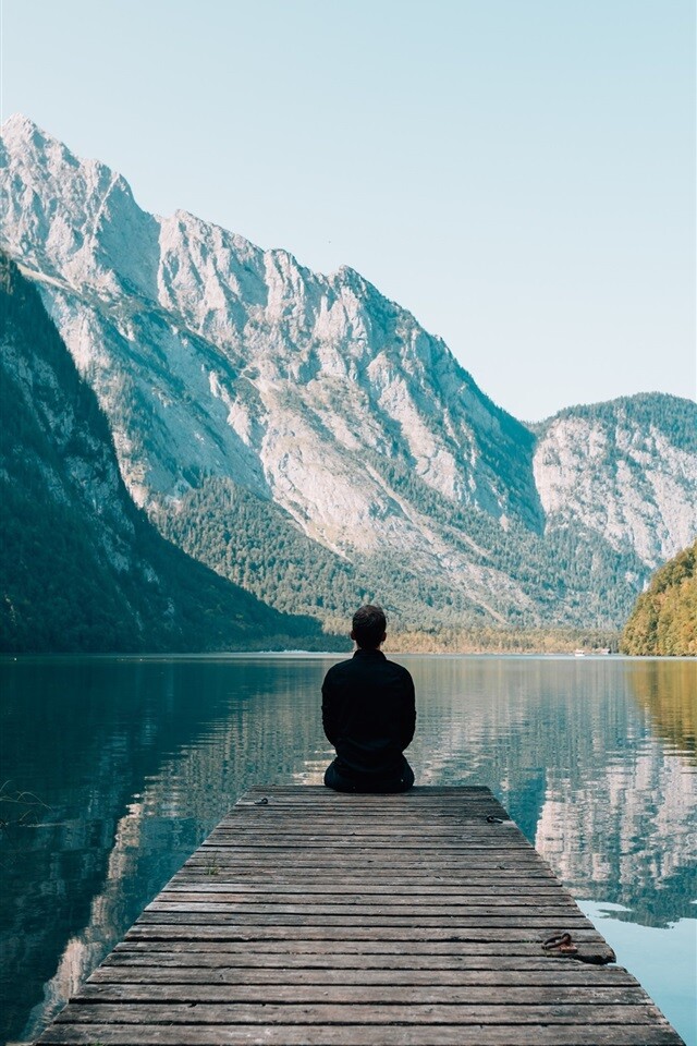 Pier-lake-mountains-lonely-man_iphone_640x960.jpg