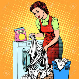 46534509-A-woman-washes-clothes-in-a-washing-machi