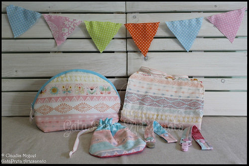 Necéssaire, muda-fraldas e prendedor de chupeta 