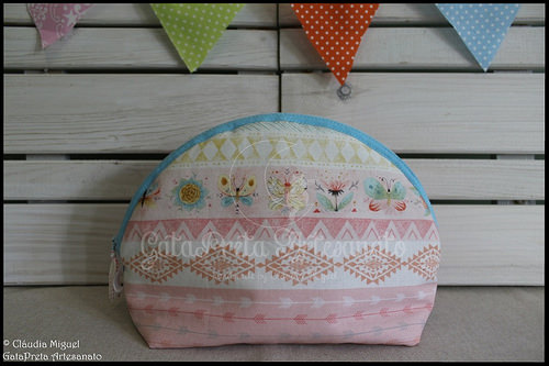 Necéssaire, muda-fraldas e prendedor de chupeta 